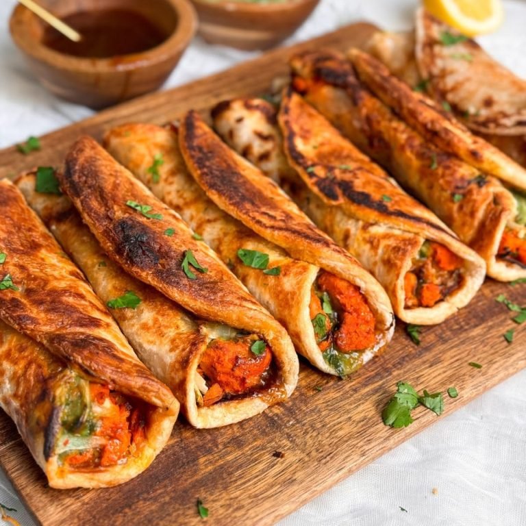 Chicken tikka paratha rolls with flaky paratha and creamy sauce